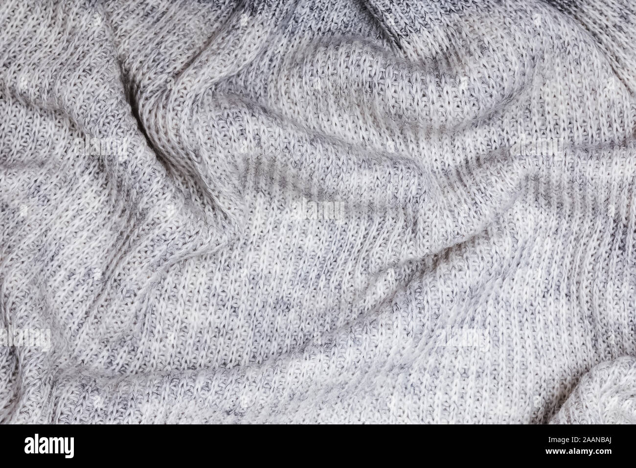 Grau cashemire Stoff Textur. Weiche gestrickten Wollpullover Hintergrund. Stockfoto