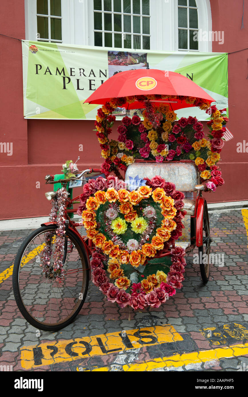 Eine dekorierte Trishaw in Malakka, Malaysia Stockfoto