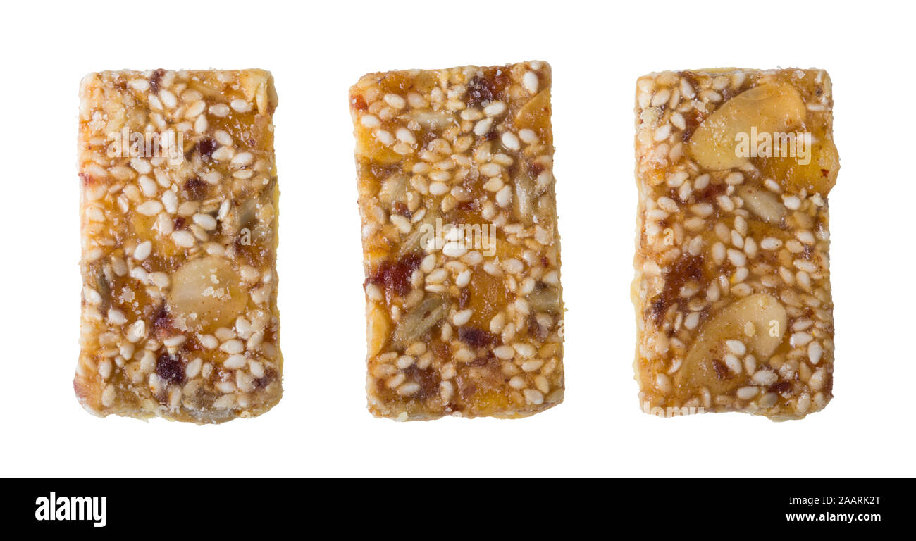 Süßer Mürbteig Plätzchen mit Honig glasiert Beschichtung. Der rechteckige Xmas Cookies voll ein Mandeln, Trockenfrüchte, Sesam und Sonnenblumenkerne oder Rosinen. Stockfoto