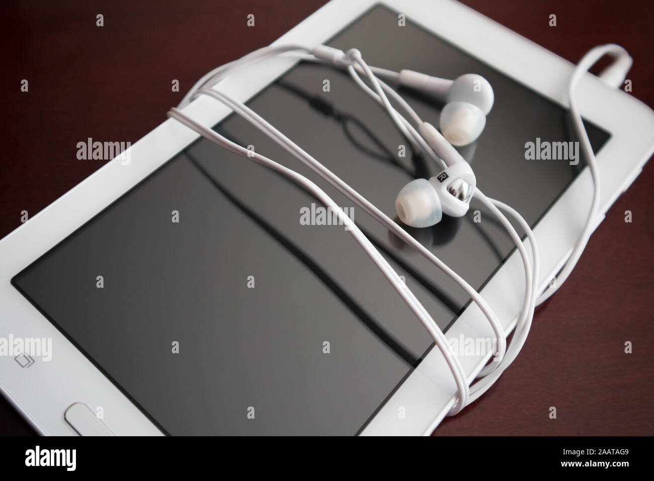 Digitale Tablet und ohrset. Stockfoto