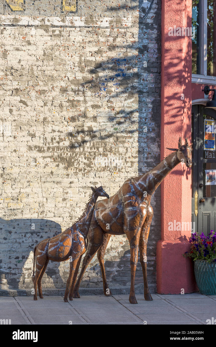 Giraffe Skulpturen in der Innenstadt von Baker City, Oregon. Stockfoto