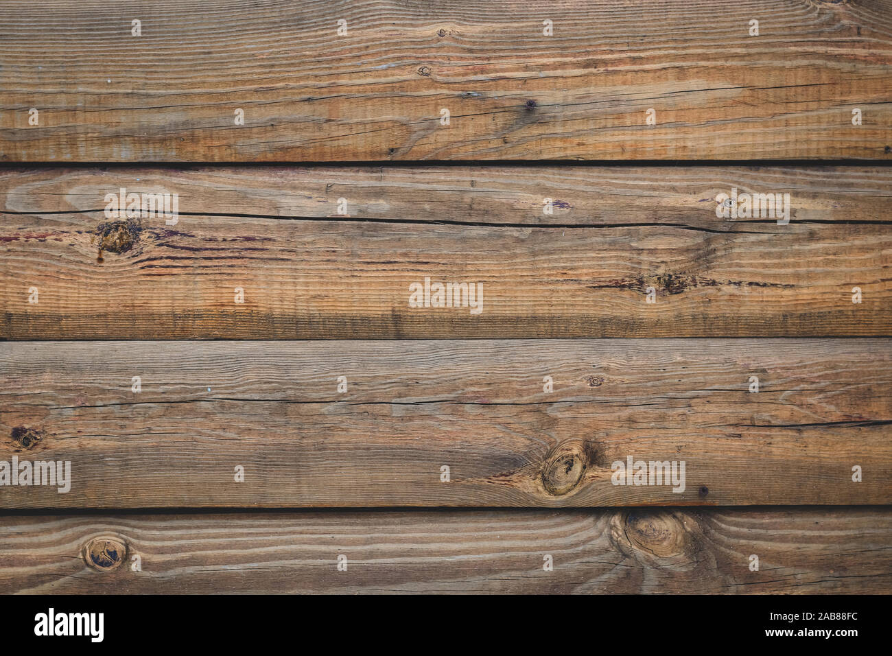 Vintage brown Holz Zaun, Schreibtisch Oberfläche. Natürliche Farbe. Braun alte Planken. Verwittertes Holz, Hintergrund. Risse schäbig Holzbrett, Textur. Stockfoto