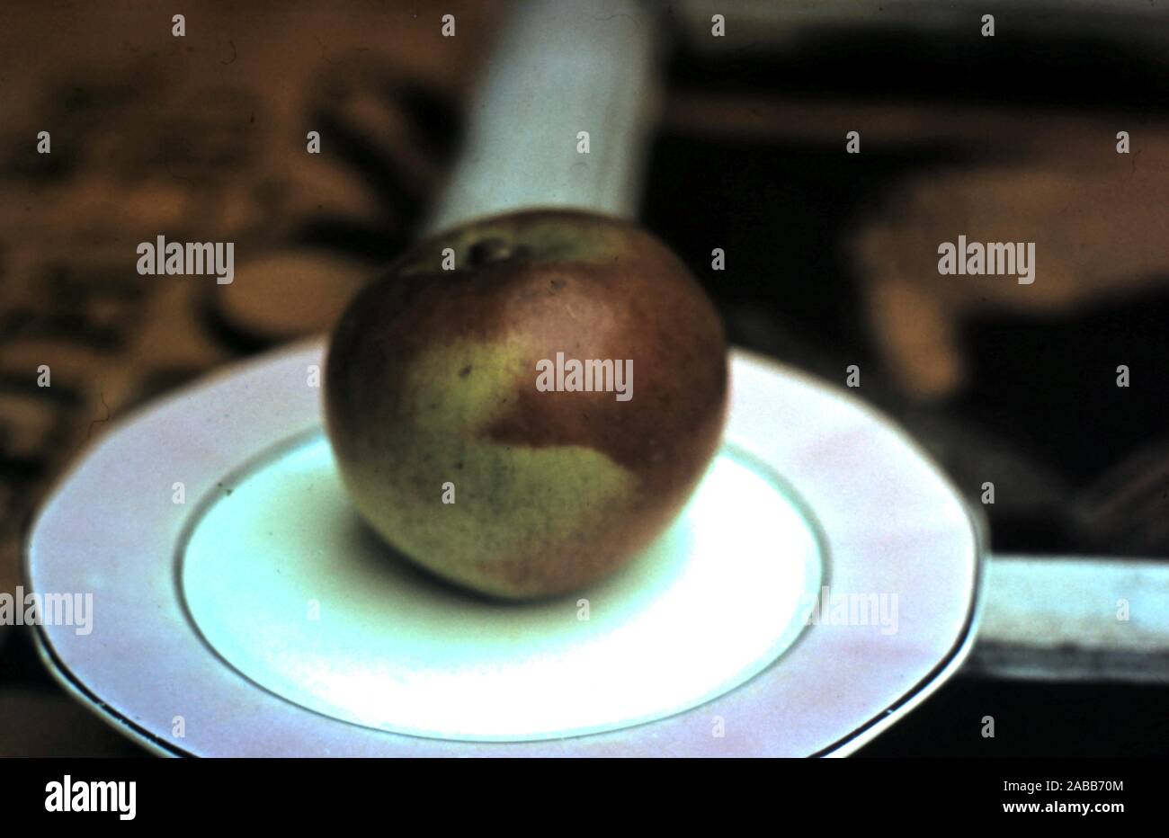 Abstract-Apple-auf-Platte Stockfoto