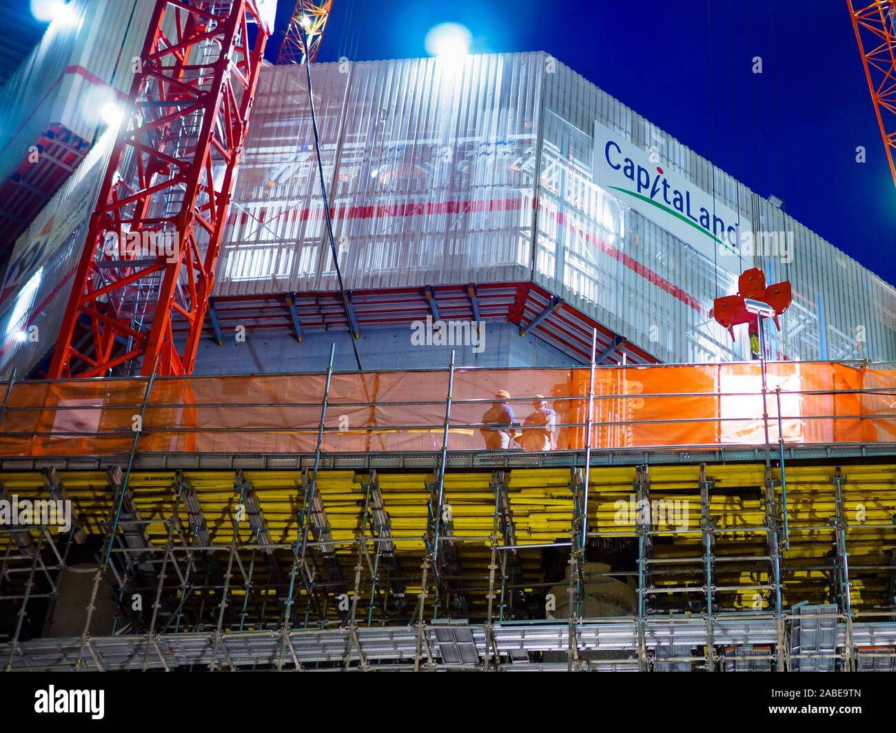 RAFFLES PLACE, Singapur - 29 Mär 2019 - Bauarbeiter/Bauherren auf der Baustelle für CapitaSpring, einer kommerziellen Gebäude am Raffles Place Stockfoto