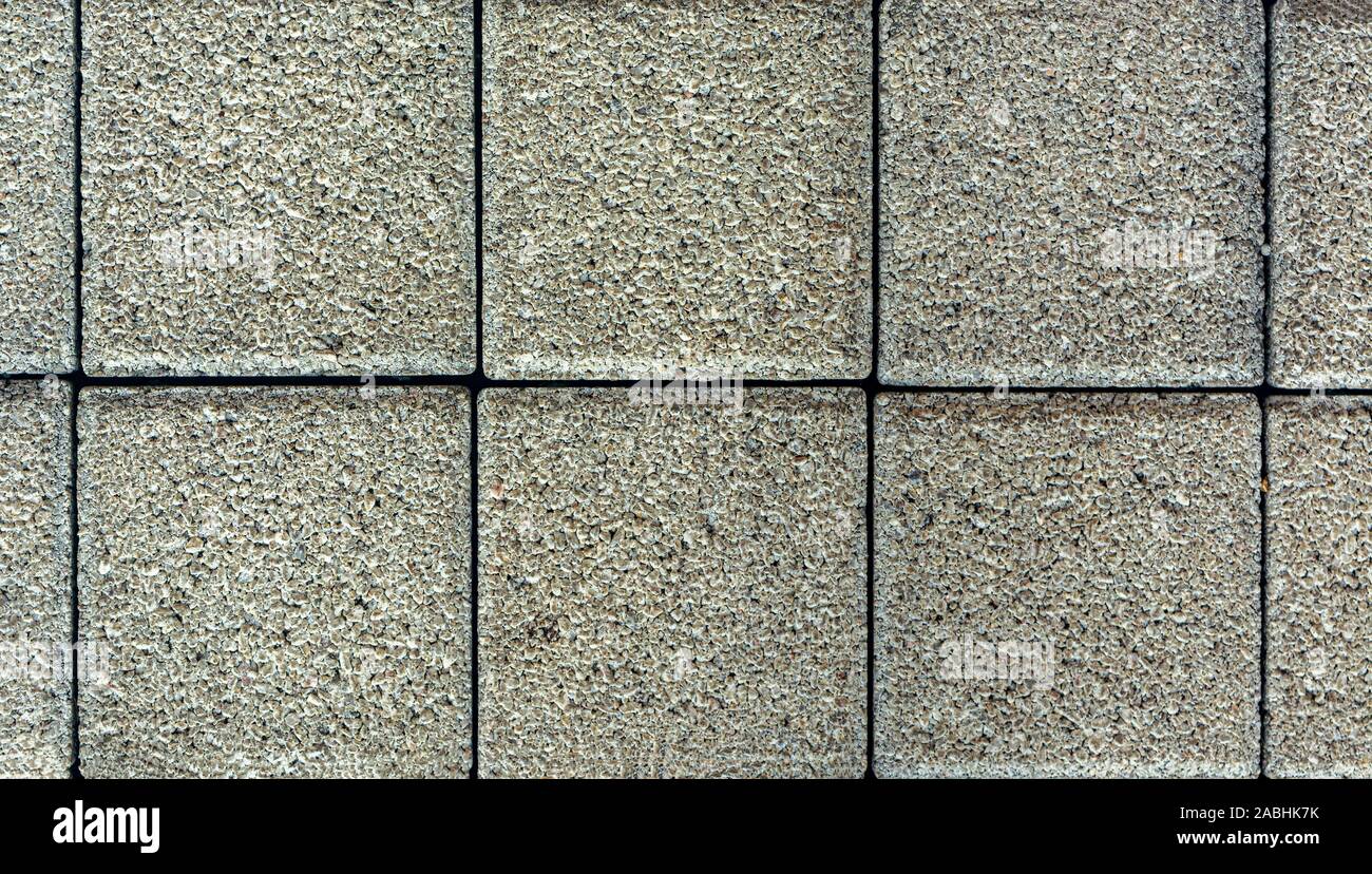 Brick Bordstein Fliese, Ansicht von oben. Städtische Textur als Hintergrund. Steinboden Textur. Granit gepflasterten Gehsteig Hintergrund. closeup Stockfoto