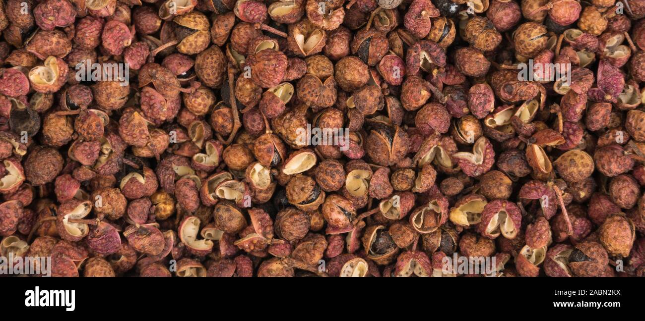 Sichuan Pfeffer Hintergrund. Natürliche Gewürze Textur. Gewürze und Zutaten. Stockfoto