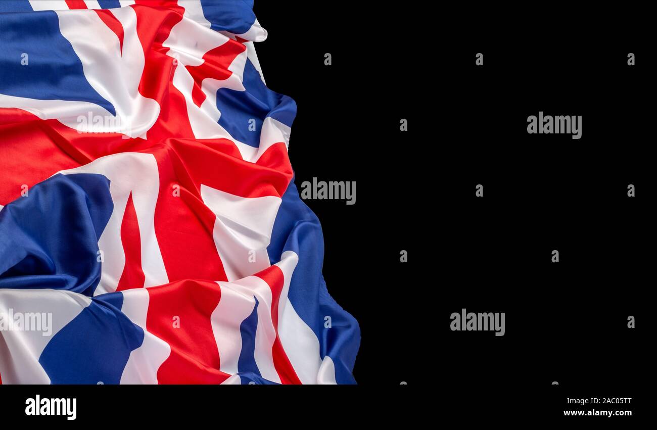 Nahaufnahme von gekräuselten Britische Flagge - Fabric auf schwarzem Hintergrund Stockfoto