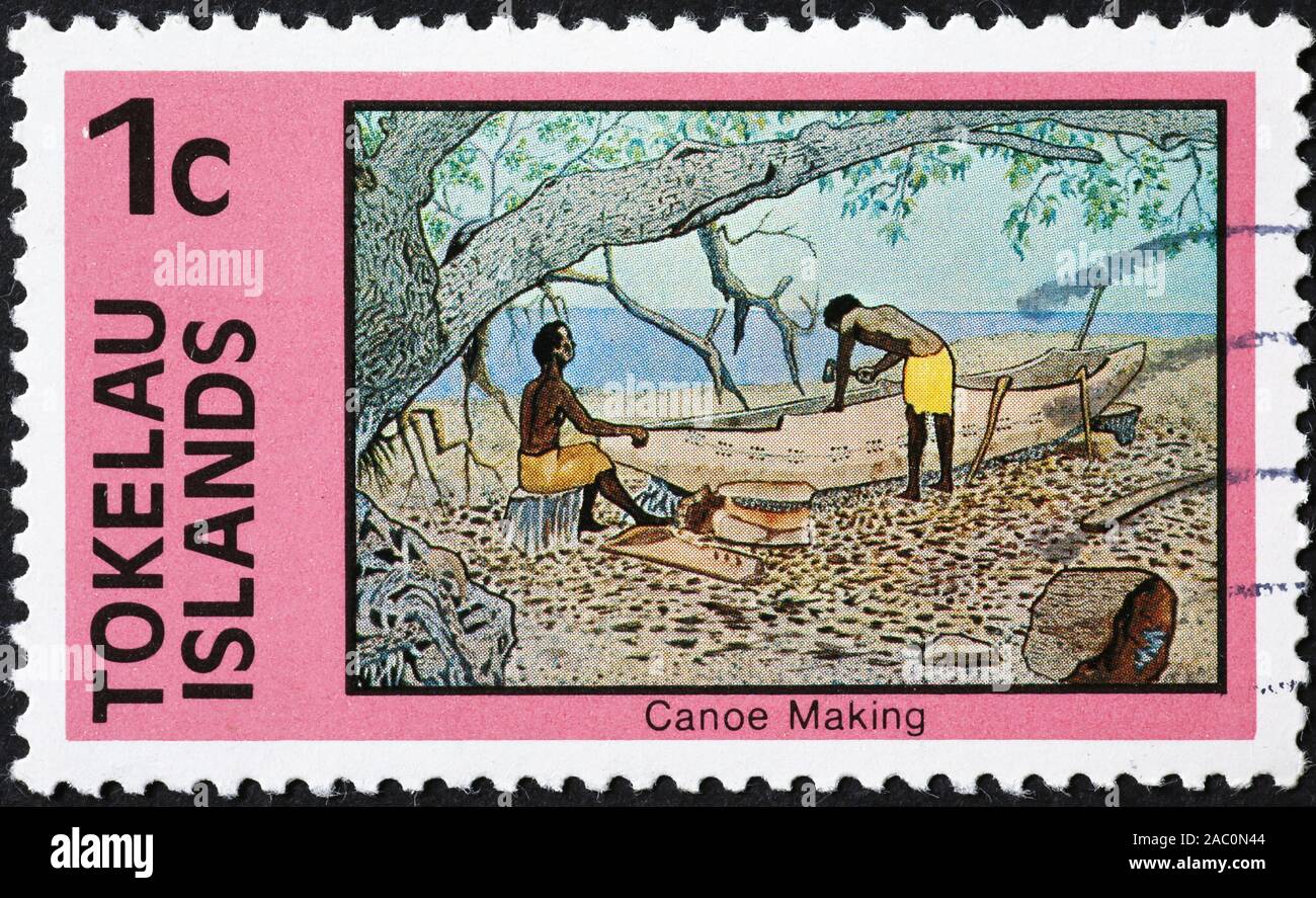 Kanu auf Briefmarke von Tokelau Stockfoto