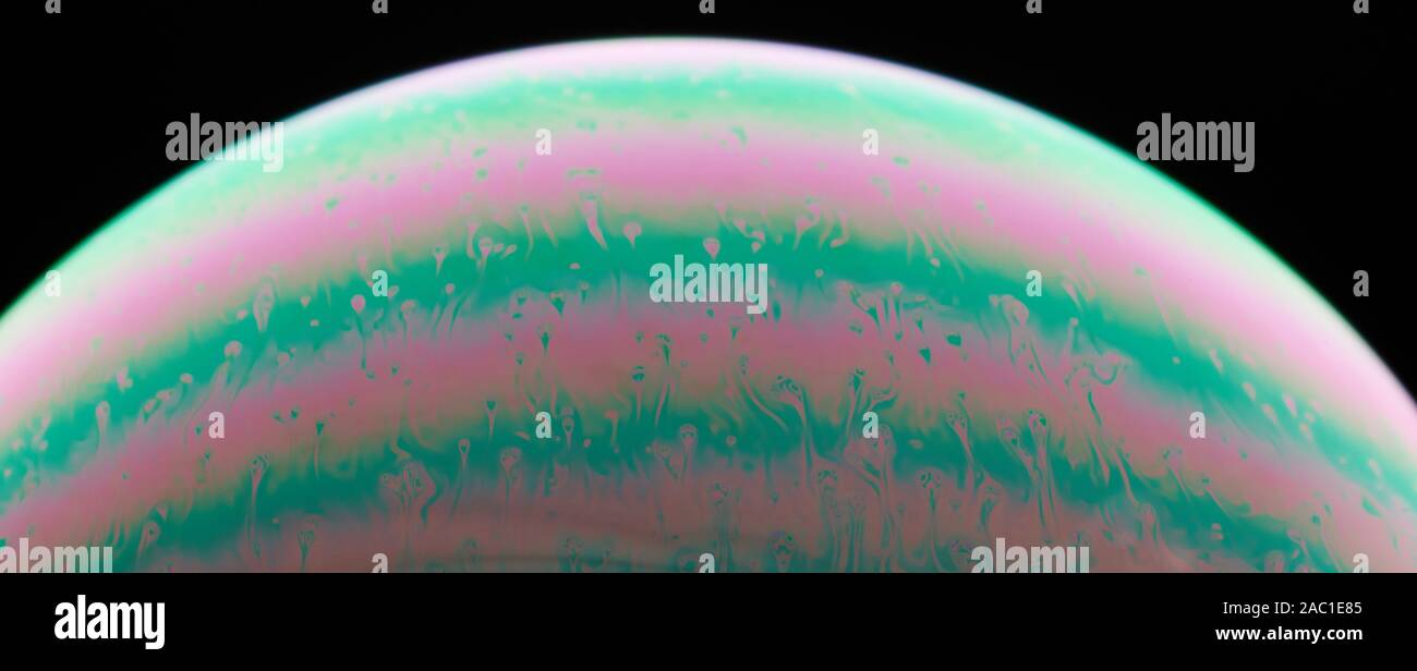 Lila und Grün Flüssigkeit Hintergrund Makro Nahaufnahme Stockfoto