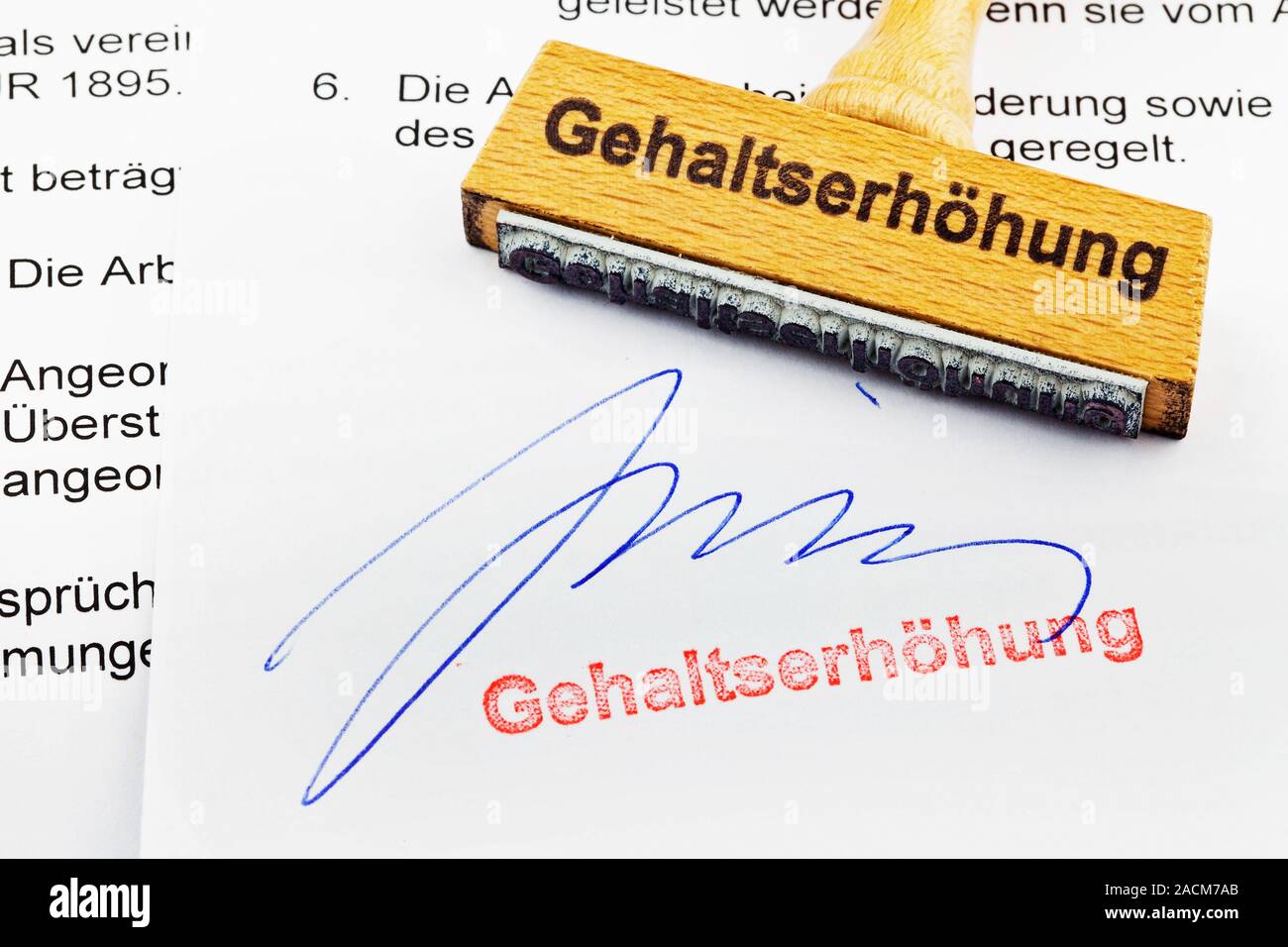 Holz Stempel auf Dokument: Gehaltserhöhung Stockfoto