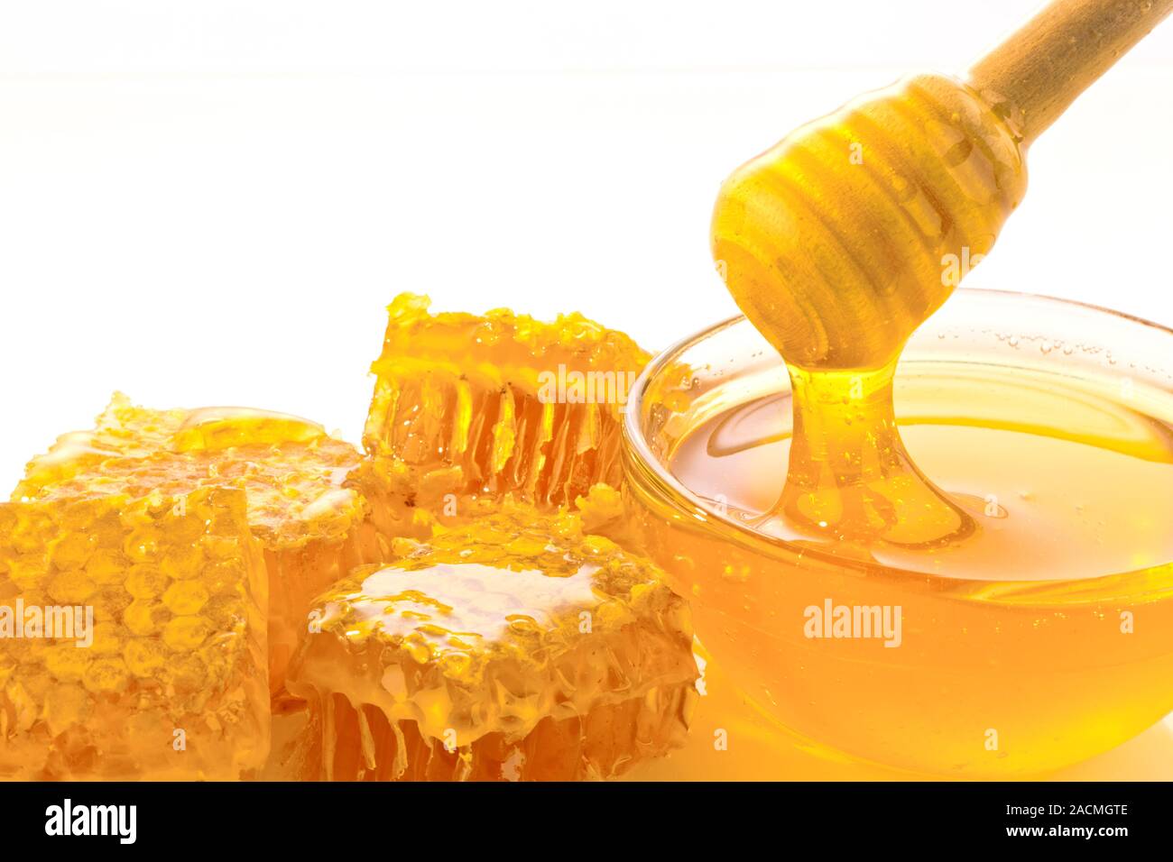 Honig Löffel und Honig Stockfoto