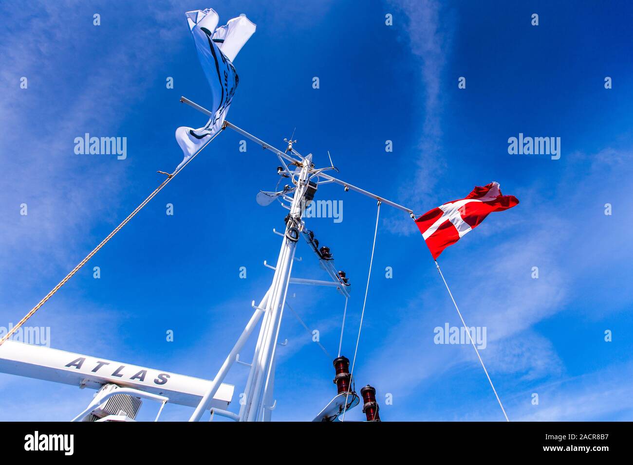 Dänische Flagge und Marke Stockfoto