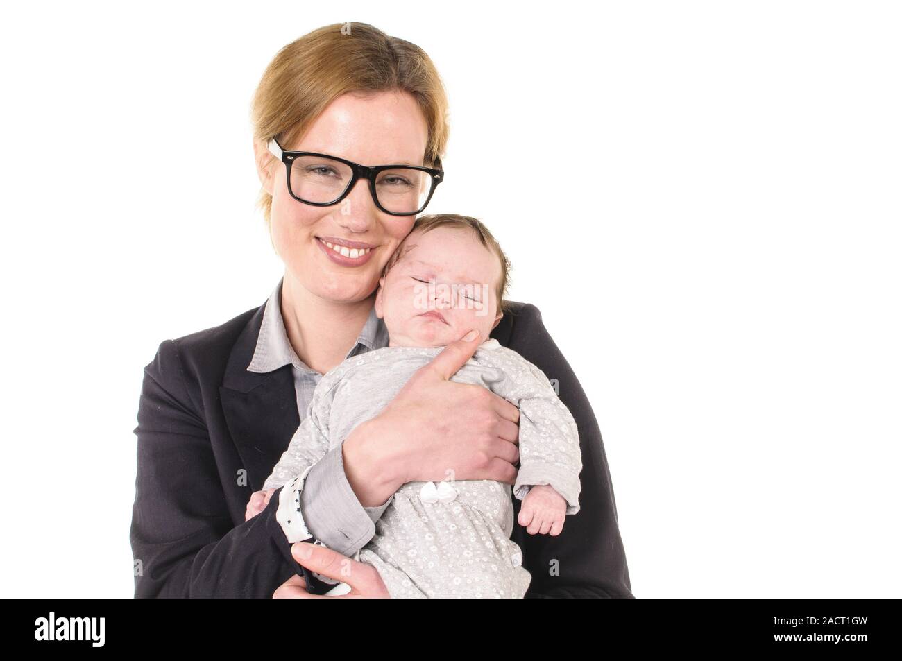 Business Frau mit Baby auf dem Arm Stockfoto