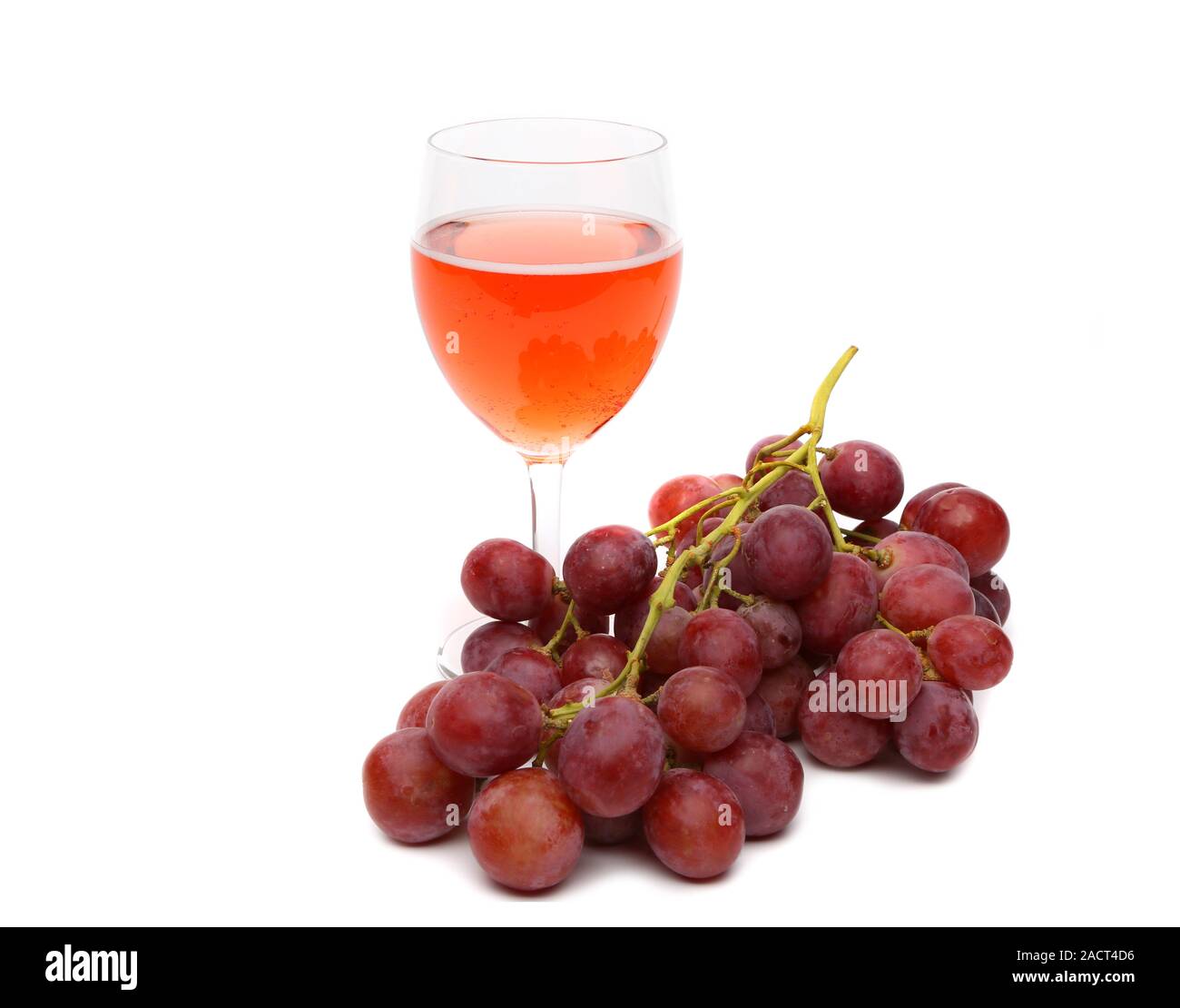 Glas Wein und Trauben Stockfoto