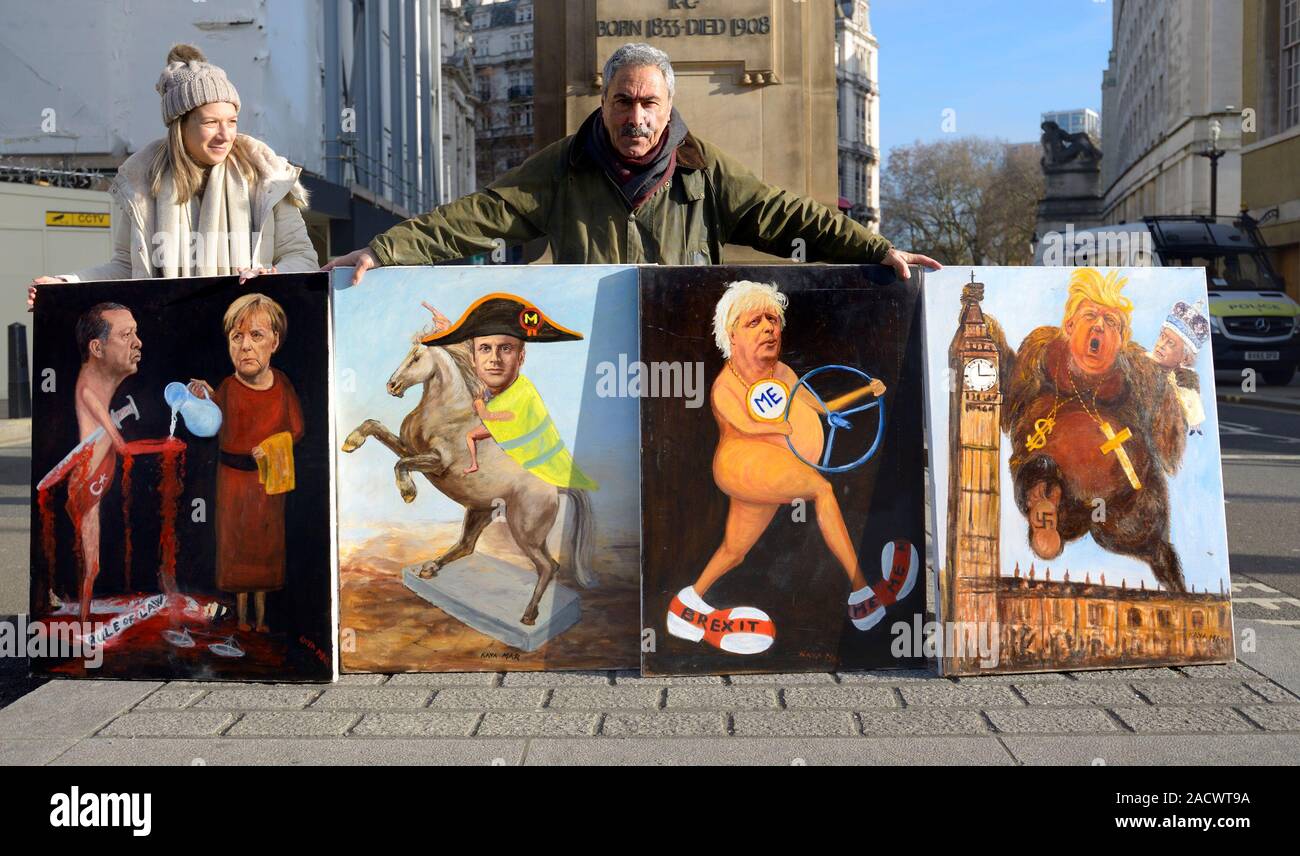 London, Großbritannien. Dezember 2019. Der satirische Künstler Kaya Mar wartet darauf, die führenden Politiker der Welt in Whitehall mit seinen Darstellungen von Präsident Emanuel Macron, Angela Merkel, Recep Erdogan, Boris Johnson und Donald Trump willkommen zu heißen. Quelle: Phil Robinson/Alamy Live News Stockfoto
