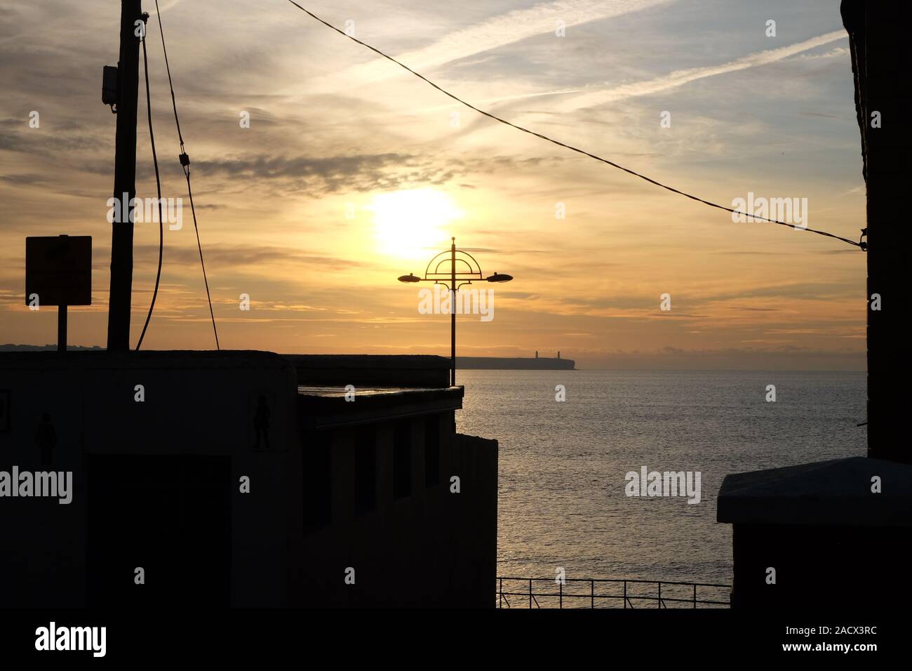 Am frühen Morgen Sonnenaufgang Damen Slip, Tramore Strand Stockfoto