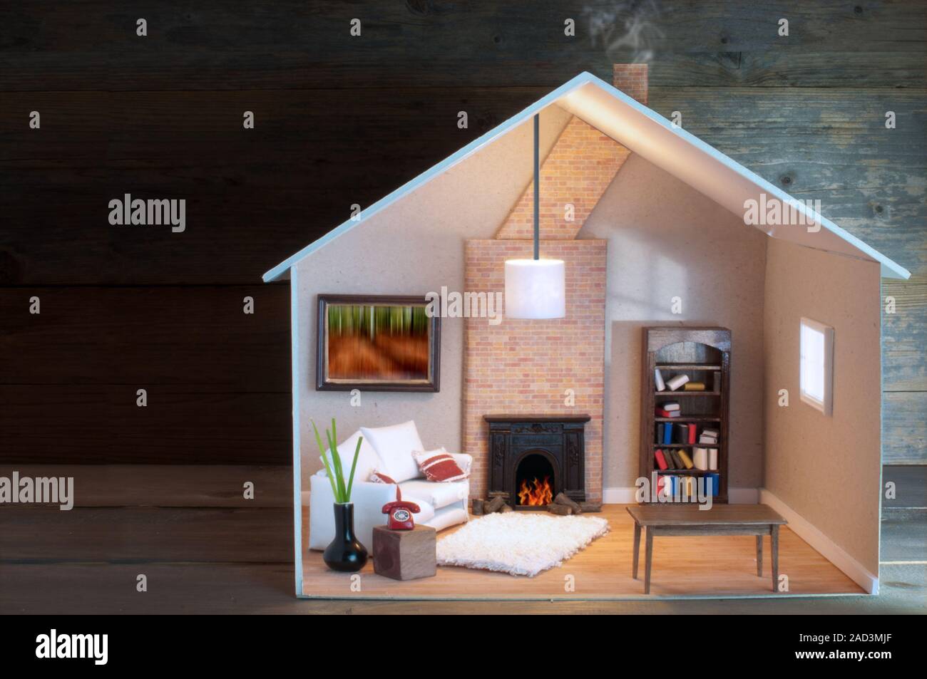 Modell Haus mit Lichtern auf der Innenseite über Holz mit Platz Stockfoto
