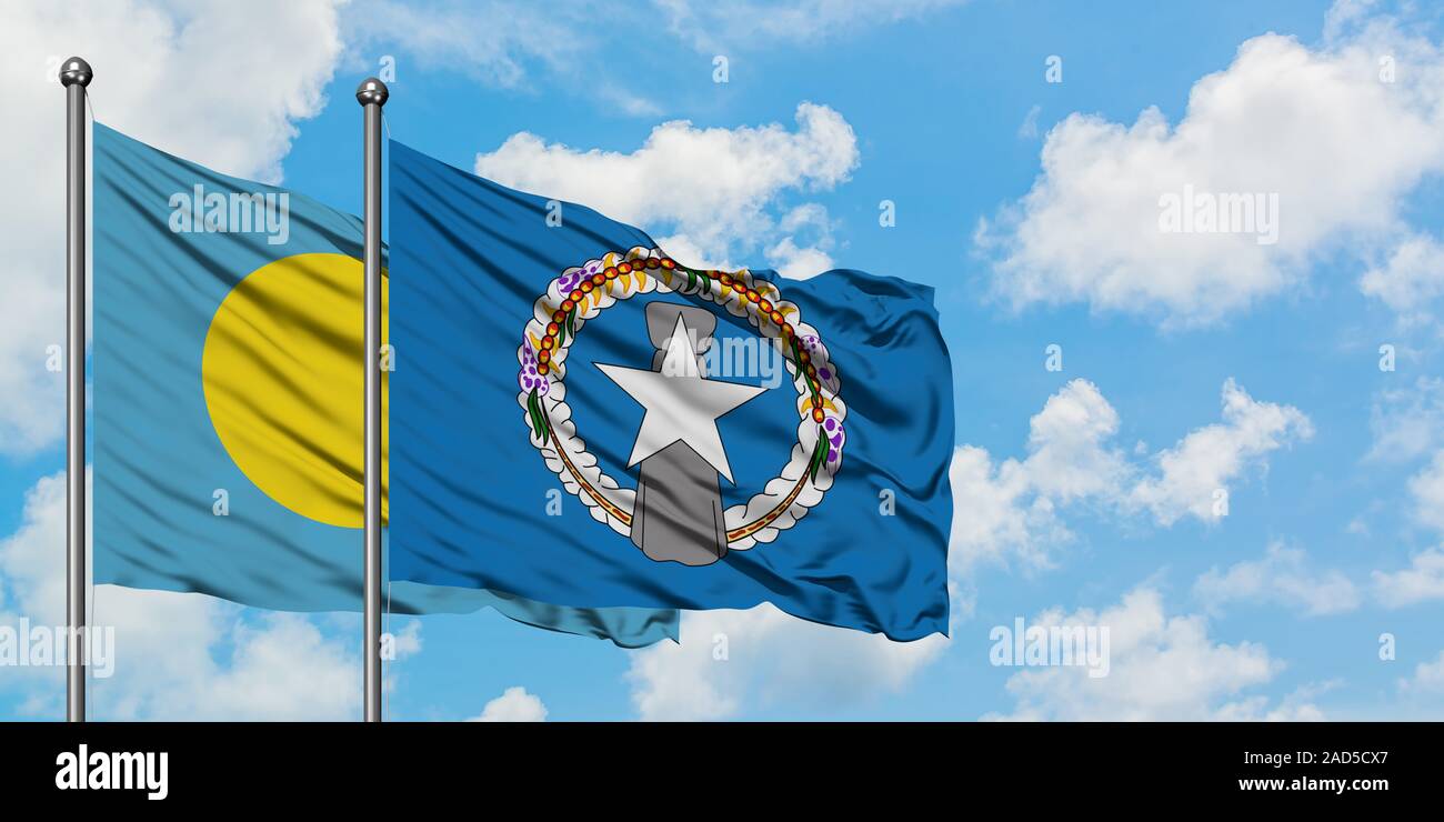 Palau und Nördliche Marianen Flagge Inseln im Wind gegen Weiße bewölkt blauer Himmel zusammen. Diplomatie Konzept, internationale Beziehungen. Stockfoto