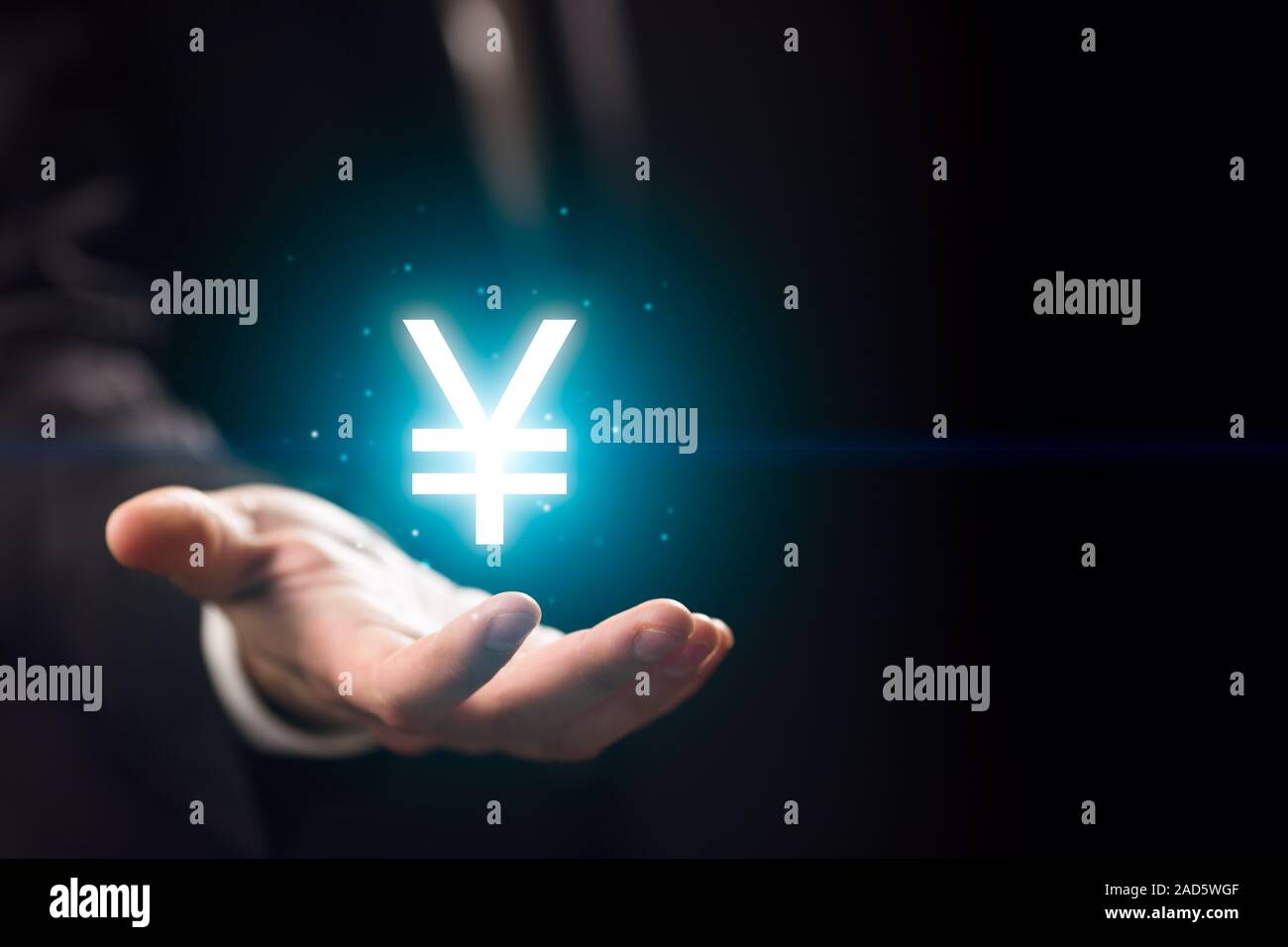 Unternehmer-Hand mit Yen-symbol Stockfoto