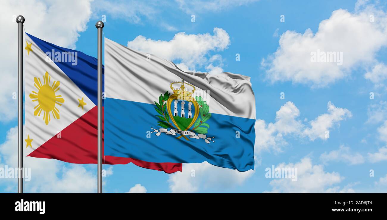 Philippinen und San Marino Fahne im Wind gegen Weiße bewölkt blauer Himmel zusammen. Diplomatie Konzept, internationale Beziehungen. Stockfoto