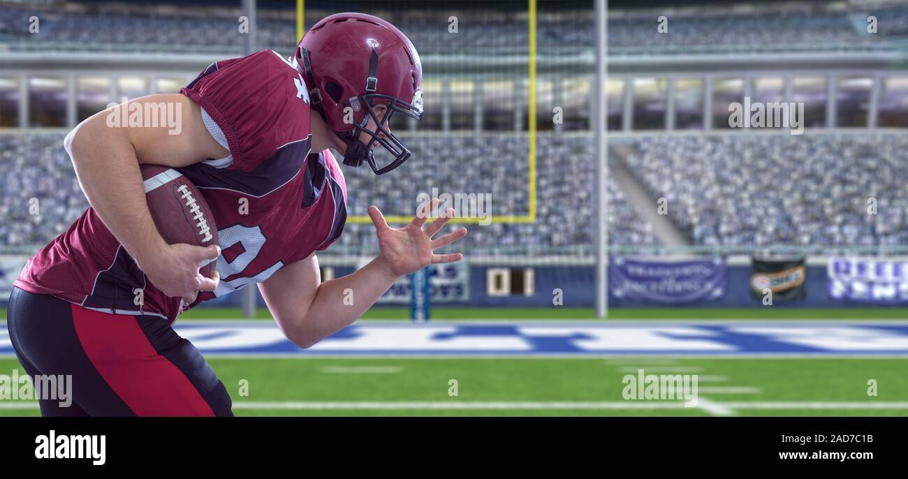 American Football Spieler laufen mit dem Ball Stockfoto