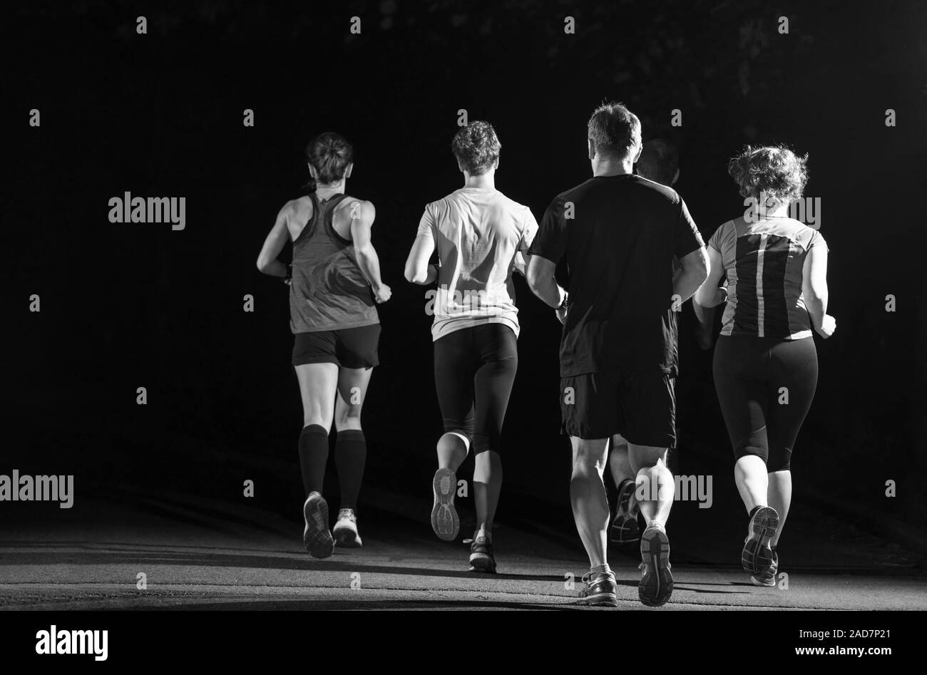 Läufer Team auf der Nacht der Ausbildung Stockfoto