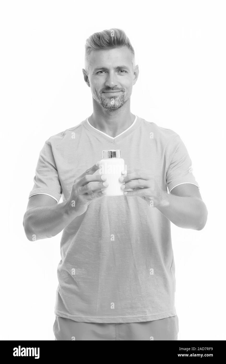Arzneimittel Konzept. Gesundheit ist Reichtum. Der bärtige Mann mit Vitamin Pille container. Gesundheit Pille. Reifer Mann mit Pille Flasche. Kerl mit Medizin Pille Vitamin Komplex. Männliche Gesundheit. Bio Zusatzstoffe. Stockfoto