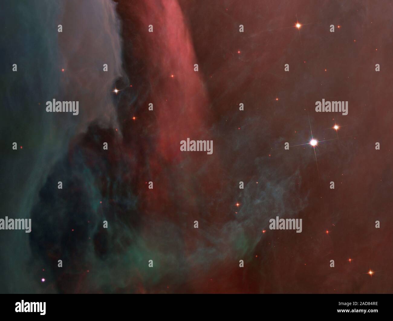 Diese dunkle rote Säule zeigt eine beleuchtete Kante der zweischaligen Wand. Objektnamen: Orionnebel, M 42, NGC 1976 Bild Typ: Astronomische Credit: NASA, ESA, M. Robberto (Space Telescope Science Institute/ESA) und das Hubble Space Telescope Orion Treasury Projektteam Stockfoto