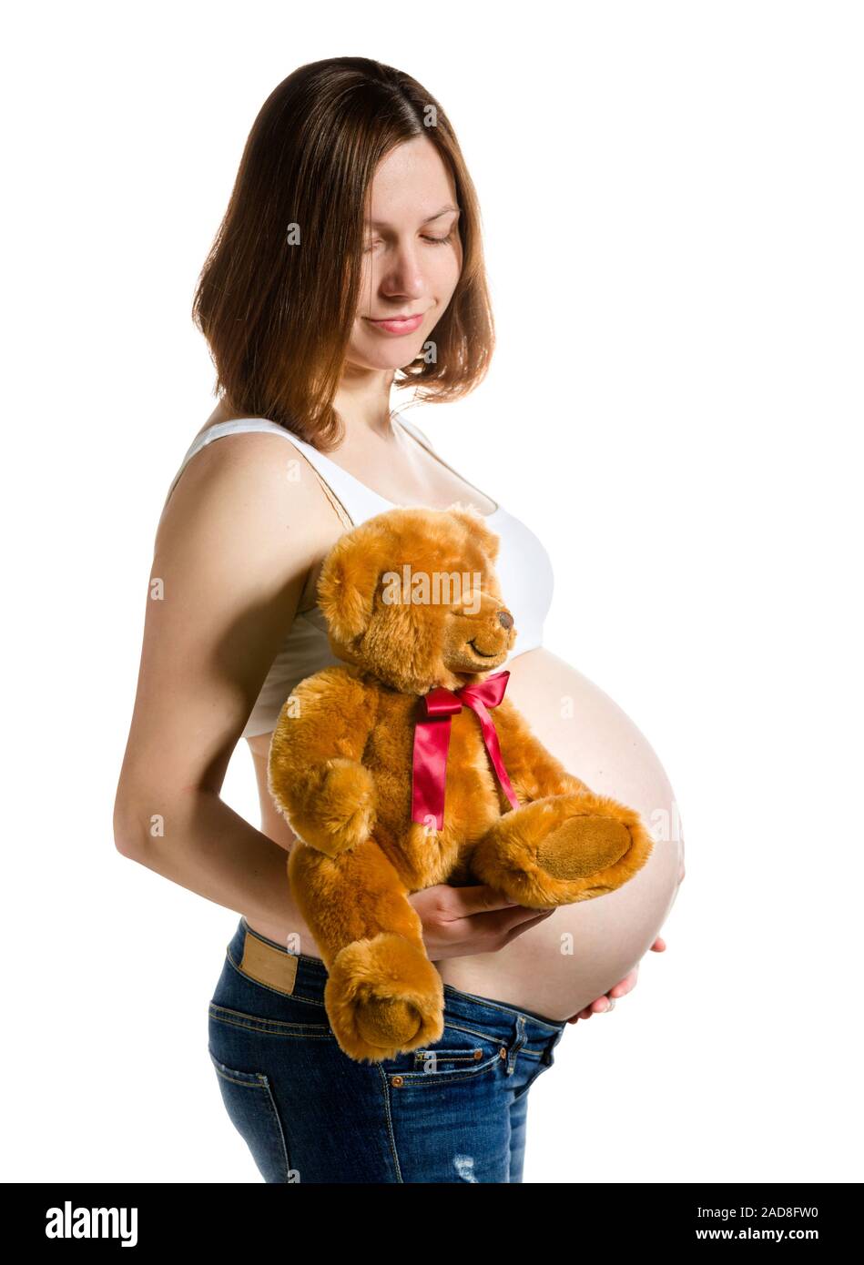 Schwangere, werdende Mutter auf weißem Hintergrund, in der Nähe von schwangeren Bauch Stockfoto