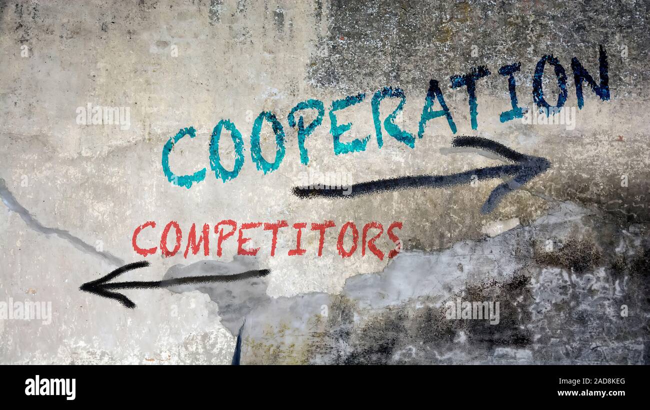 Wand Graffiti für die Zusammenarbeit im Vergleich zu Wettbewerbern Stockfoto