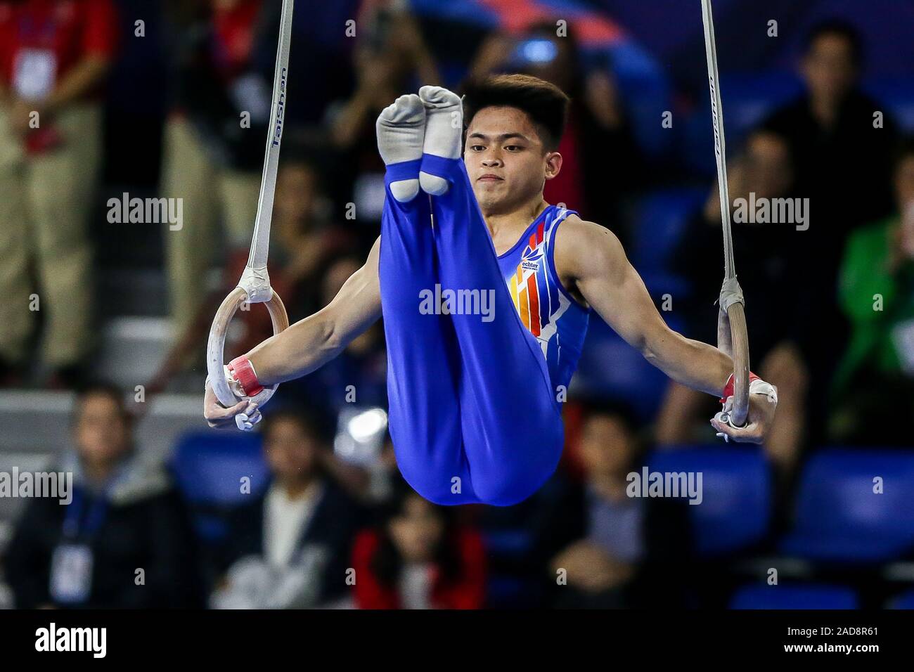 Manila, Philippinen. 3. Dezember, 2019. Carlos Edriel Yulo der Philippinen konkurriert im letzten Spiel der Herren Gymnastik künstlerischen Ringen noch an der Southeast Asian Games 2019 in Manila auf den Philippinen, Dez. 3, 2019. Credit: rouelle Umali/Xinhua/Alamy leben Nachrichten Stockfoto