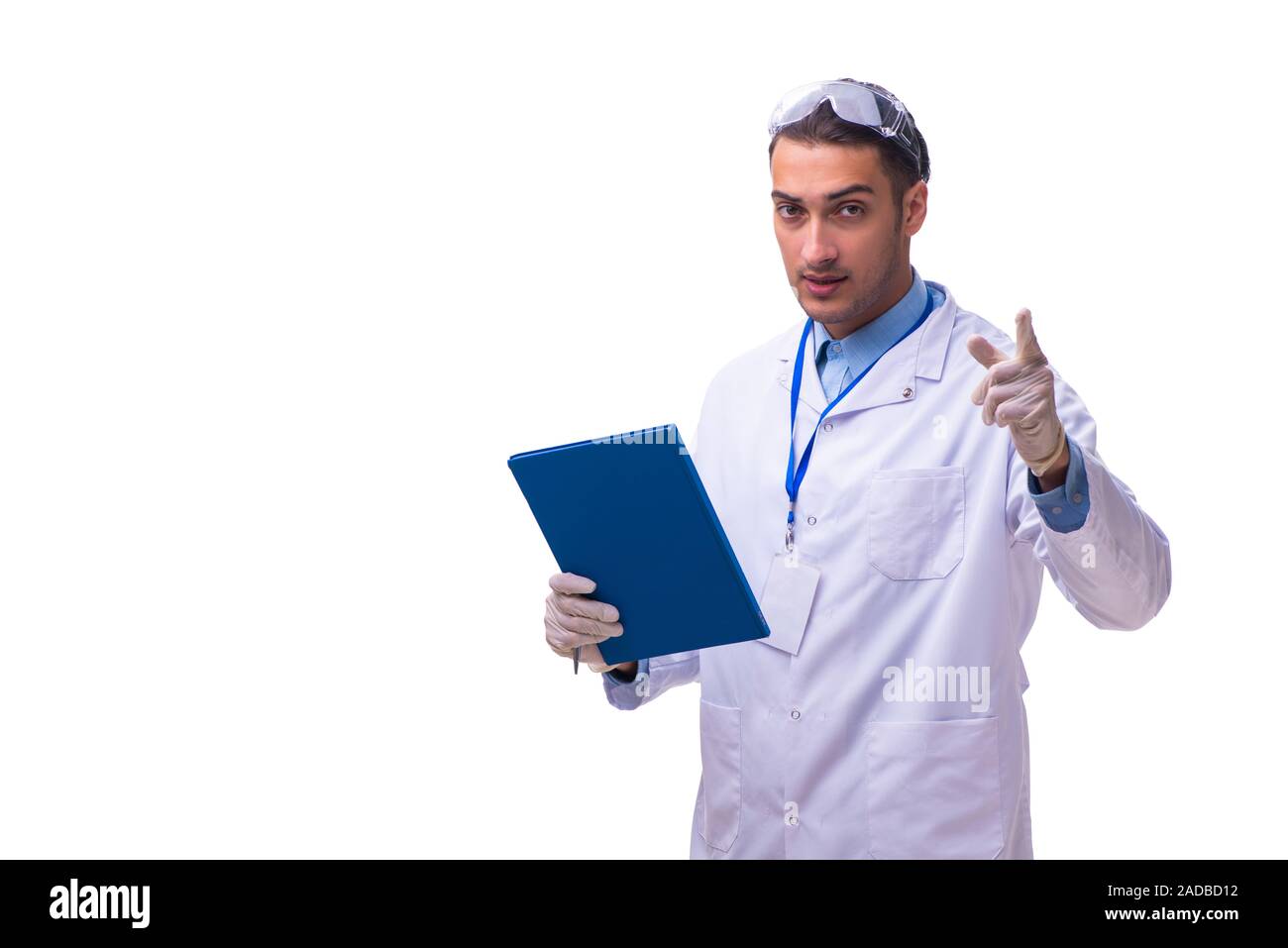 Junge männliche Arzt mit Noten isoliert auf weißem Stockfoto