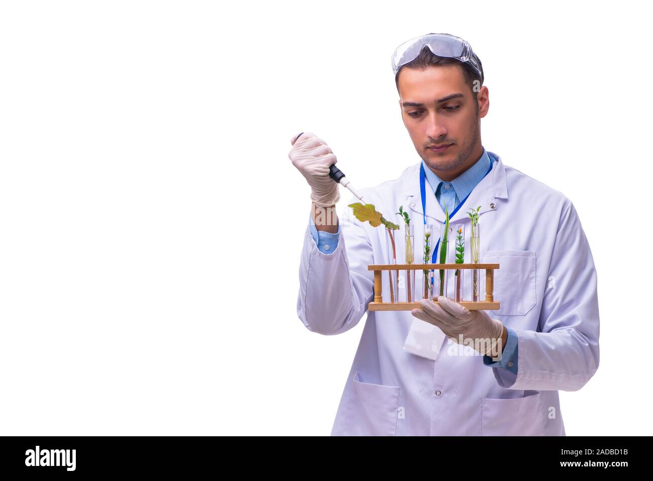 Junge männliche Chemiker isoliert auf weißem Stockfoto