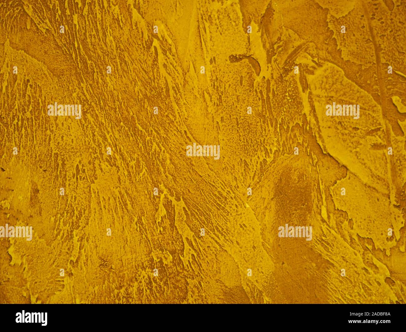 Oberfläche der Wand ist rau, Farbe in Gold Textur material Hintergrund Stockfoto