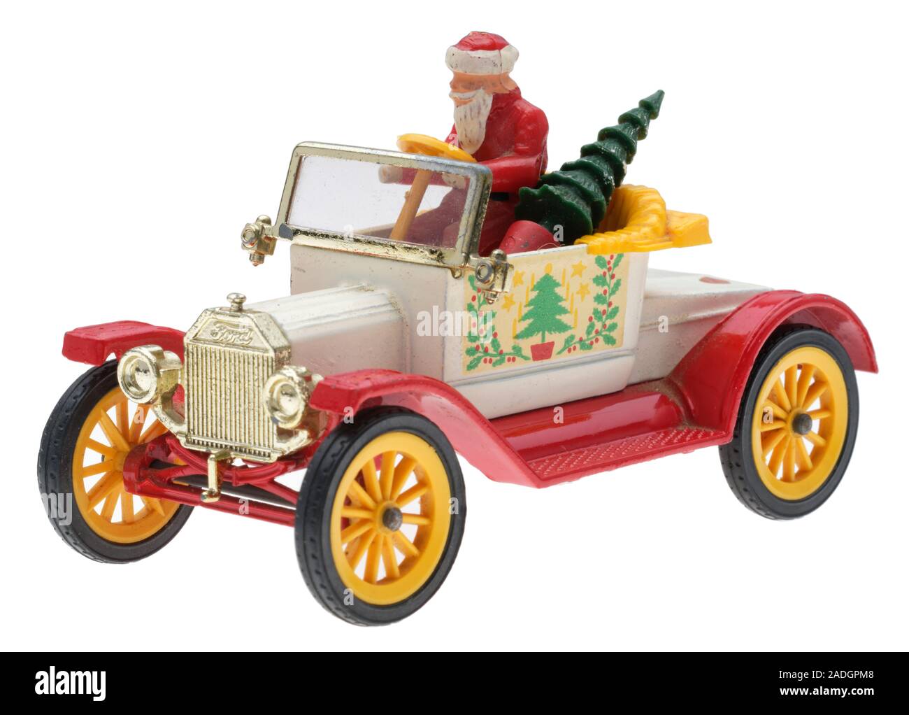 Vater Weihnachten in einem alten Ford Motor Auto. Dinky metall Spielzeug mit Santa und einen Weihnachtsbaum. Stockfoto