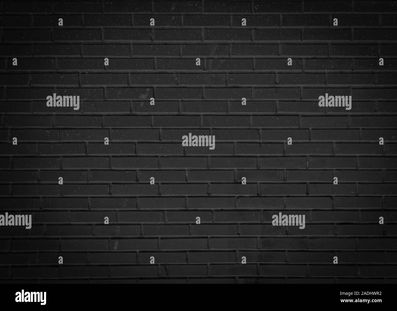 Schwarze Wand. Düstere abstrakt Hintergrund für Design. Die Textur der Backstein Oberfläche. Stockfoto