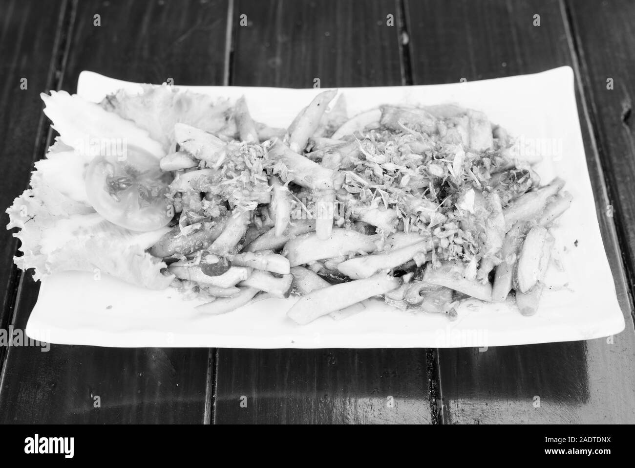 Stir-Fried Champignons mit Knoblauch und Austernsauce Stockfoto