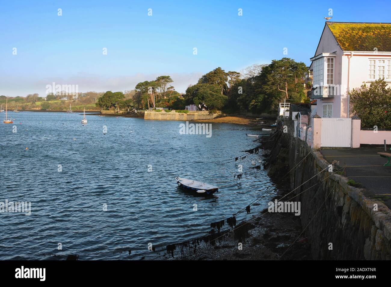 Spülen aus der Kai, Penryn Fluss, Cornwall, Großbritannien Stockfoto