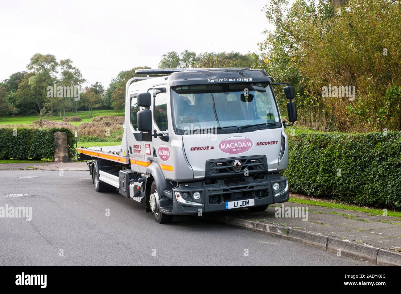 Pannenwiederaufnahme LKW wartet auf eine Sammlung von verbrannten zu machen Wir haben das Motorrad aus dem lokalen Park ausgefahren, nachdem wir Blackpool abgeladen hatten Lancs England Stockfoto