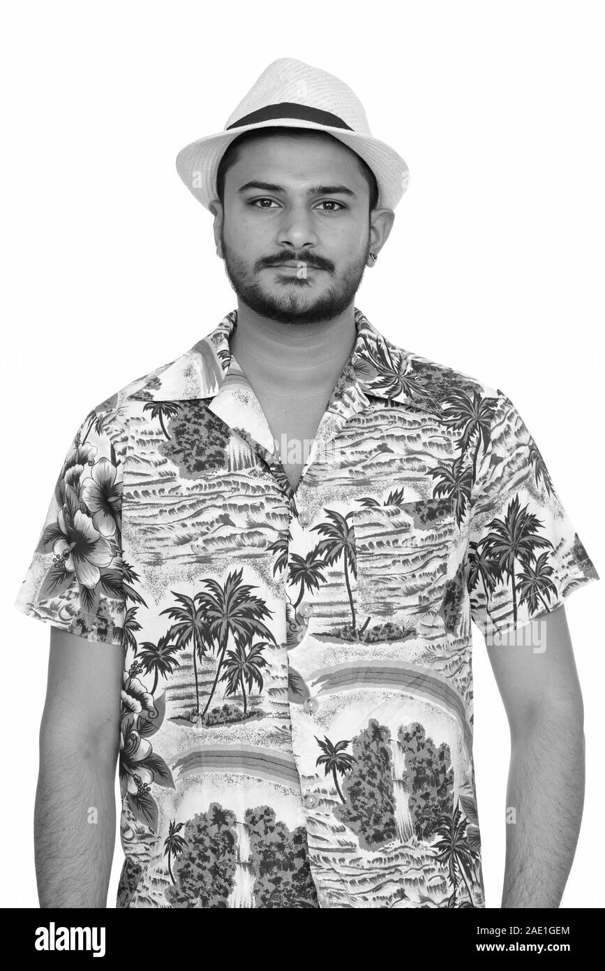 Junge schöne Indische Mann bereit für Ferienhäuser Stockfoto Junge schöne Indische Mann bereit für Ferienhäuser Stockfoto