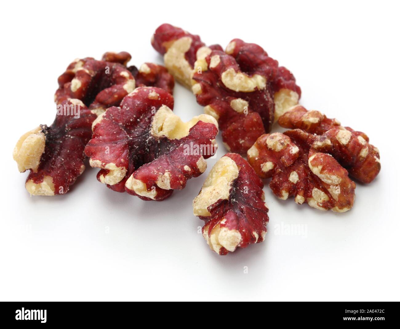 Red Walnüsse auf weißem Hintergrund Stockfoto