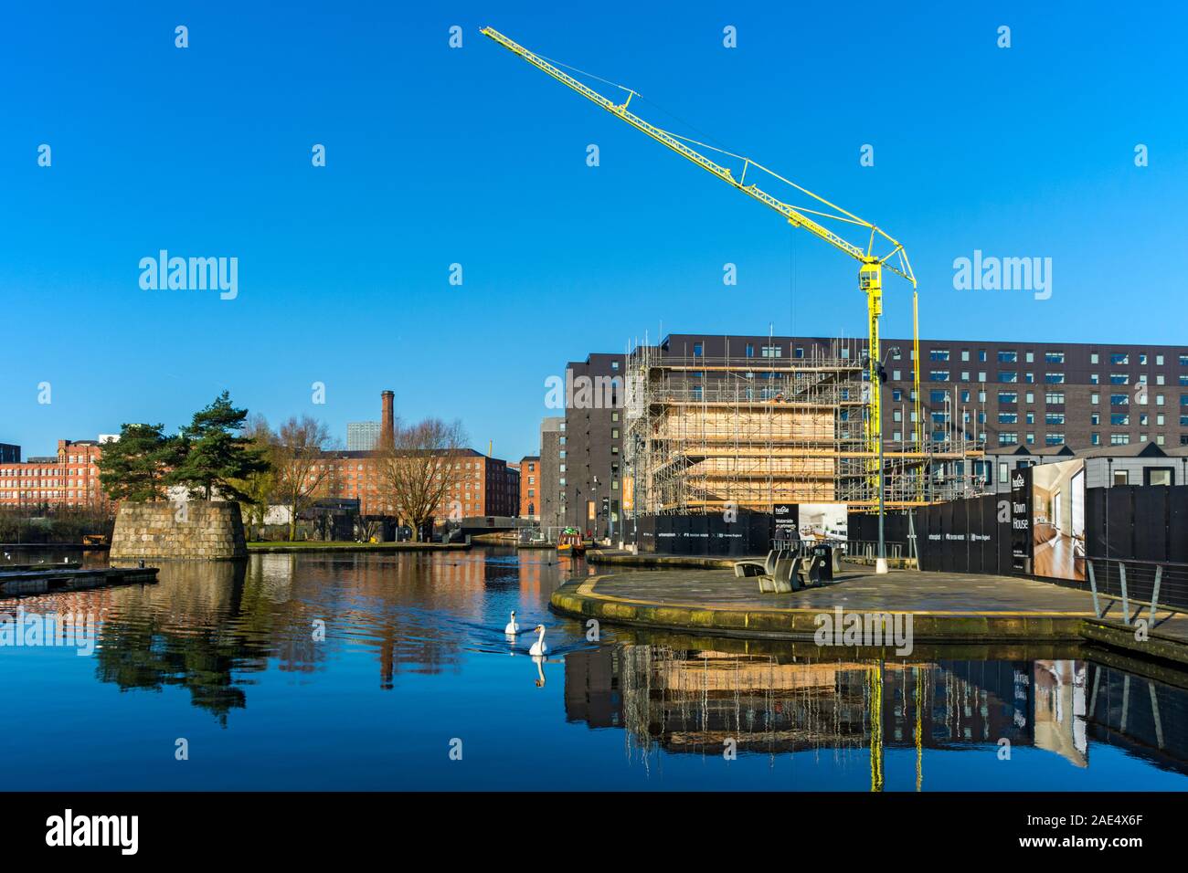 Ein Kran auf das Mansion House Apartment Block Entwicklung, neue Islington, Ancoats, Manchester, England, Großbritannien Stockfoto