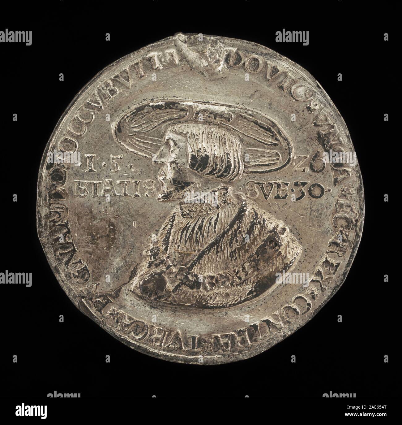 Eine deutsche Münze aus dem 16. Jahrhundert von 1526, die das Porträt von Ludwig II., König von Ungarn und Böhmen, zeigt Gesicht, Krone, Kleidung, Inschriften, und numismatisches Design. Stockfoto