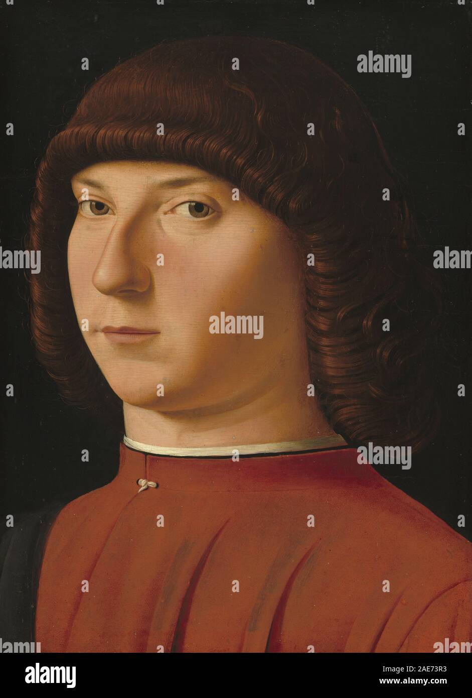 Porträt eines jungen Mannes, der Antonello da Messina zugeschrieben wurde, um 1475–1480, mit Gesichtszügen, Frisur, Kleidung, und Porträtkonventionen der frühen italienischen Renaissance. Stockfoto
