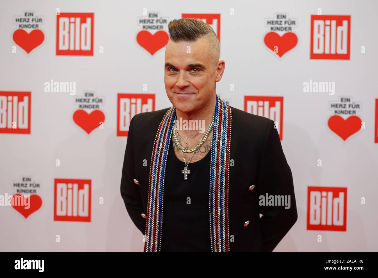 Berlin, Deutschland. 30 Okt, 2019. Robbie Williams kommt zum jährlichen Benefizgala "Ein Herz für Kinder". Auf der Messe in Berlin, möglichst viel Geld für Hilfsprojekte mit einem großen Stern Kontingent zu vereinnahmen ist. Credit: Gerald Matzka/dpa-Zentralbild/ZB/dpa/Alamy leben Nachrichten Stockfoto