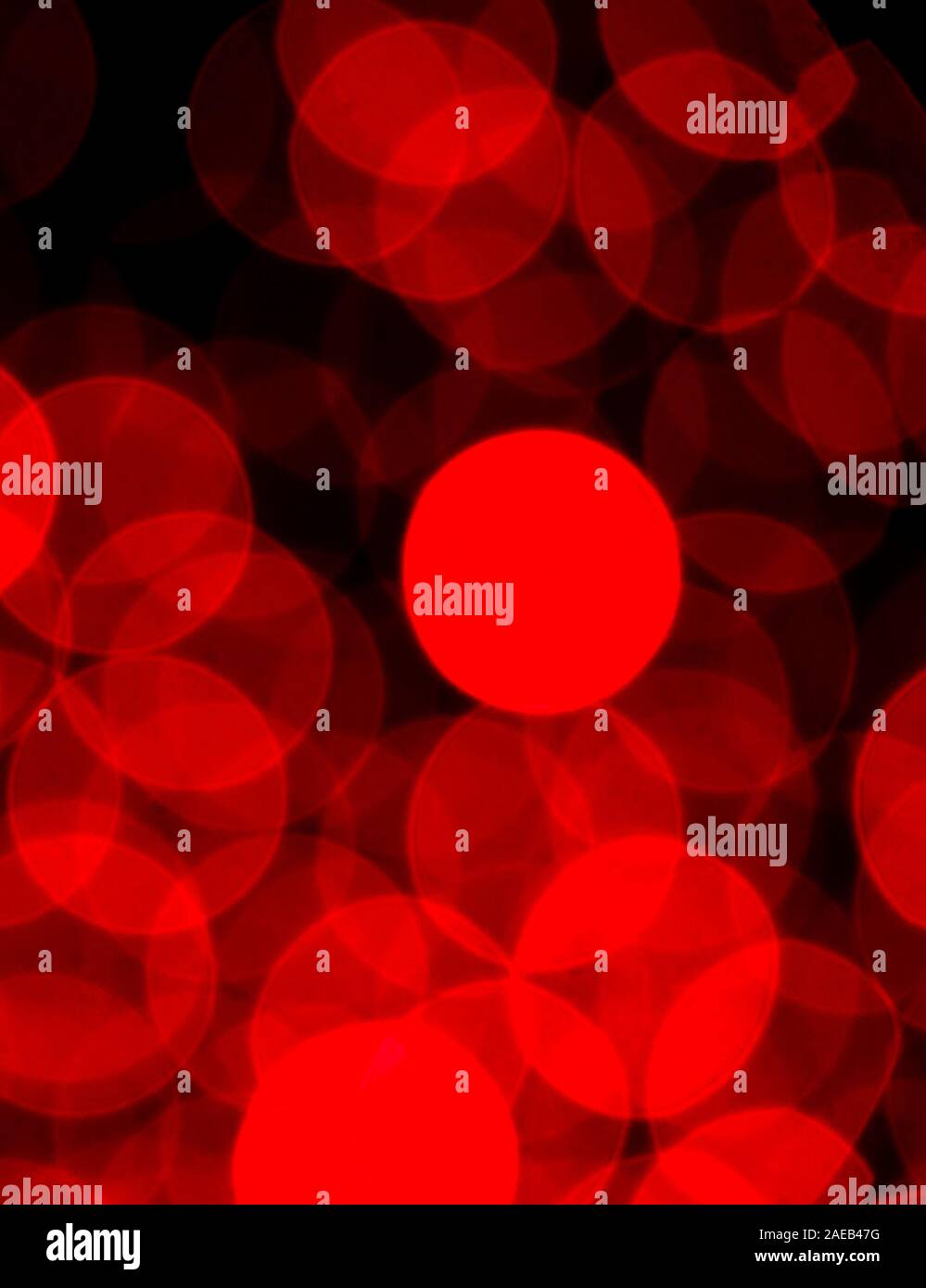 Abstrakte blurry rotes Licht Ornament, viele der Punkte, die in der glühenden nahe, Weihnachten Hintergrund Stockfoto