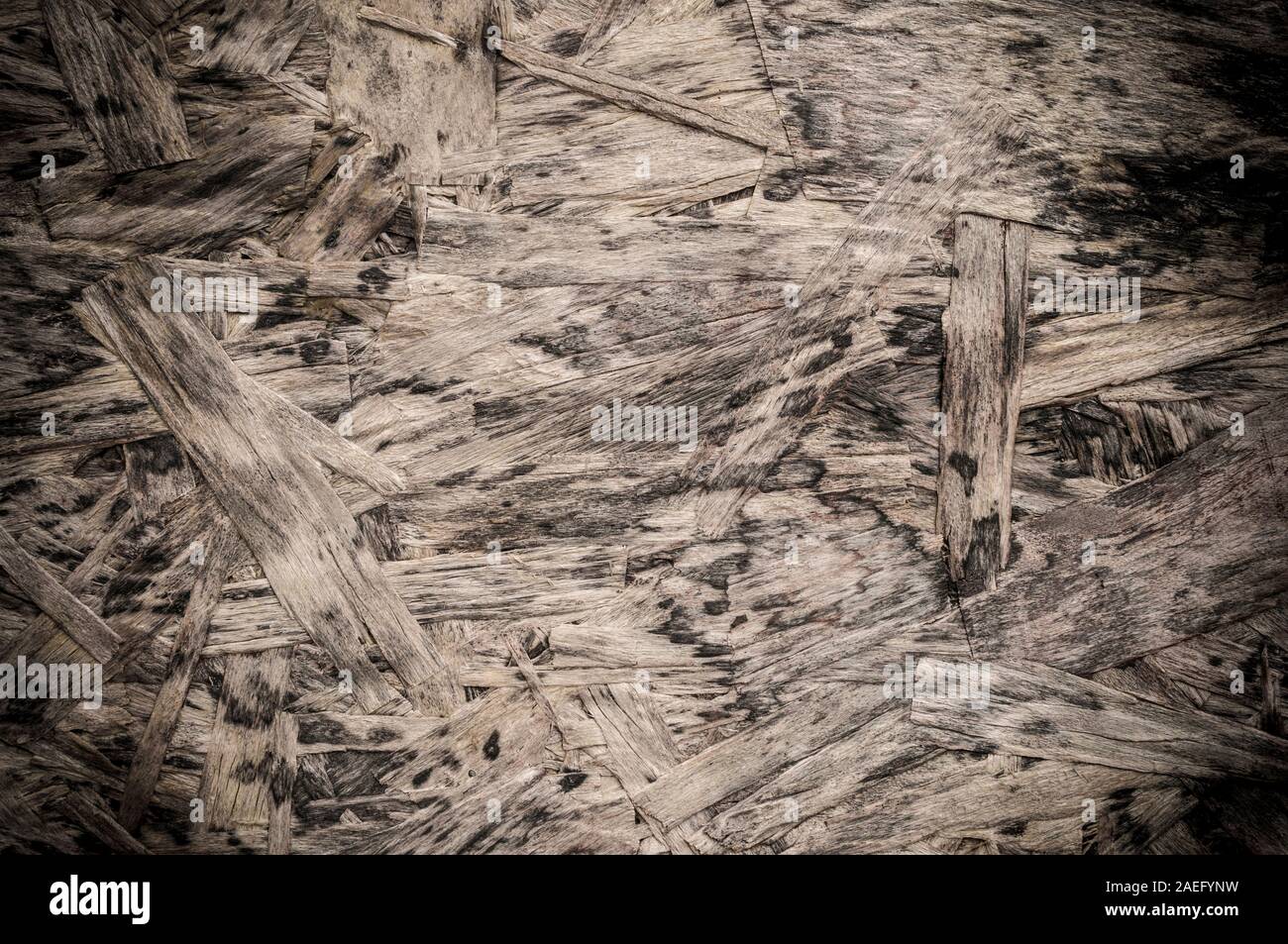 Osb Holz grunge Textur mit schwarzen Vignette Stockfoto