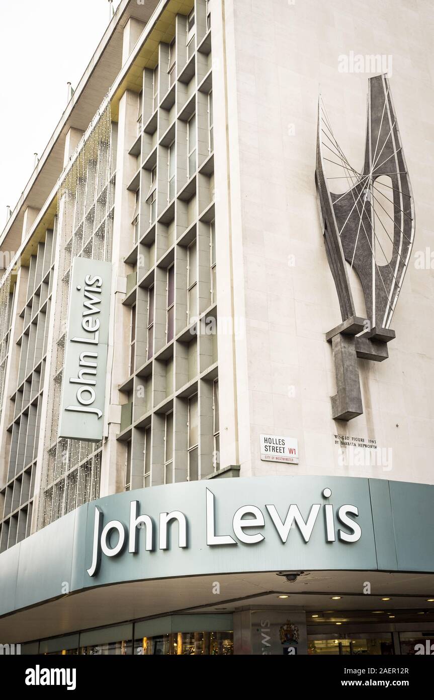 John Lewis Department Store, Oxford Street, London. Die Beschilderung und Fassade, das Flaggschiff der beliebten britischen Department Store. Stockfoto