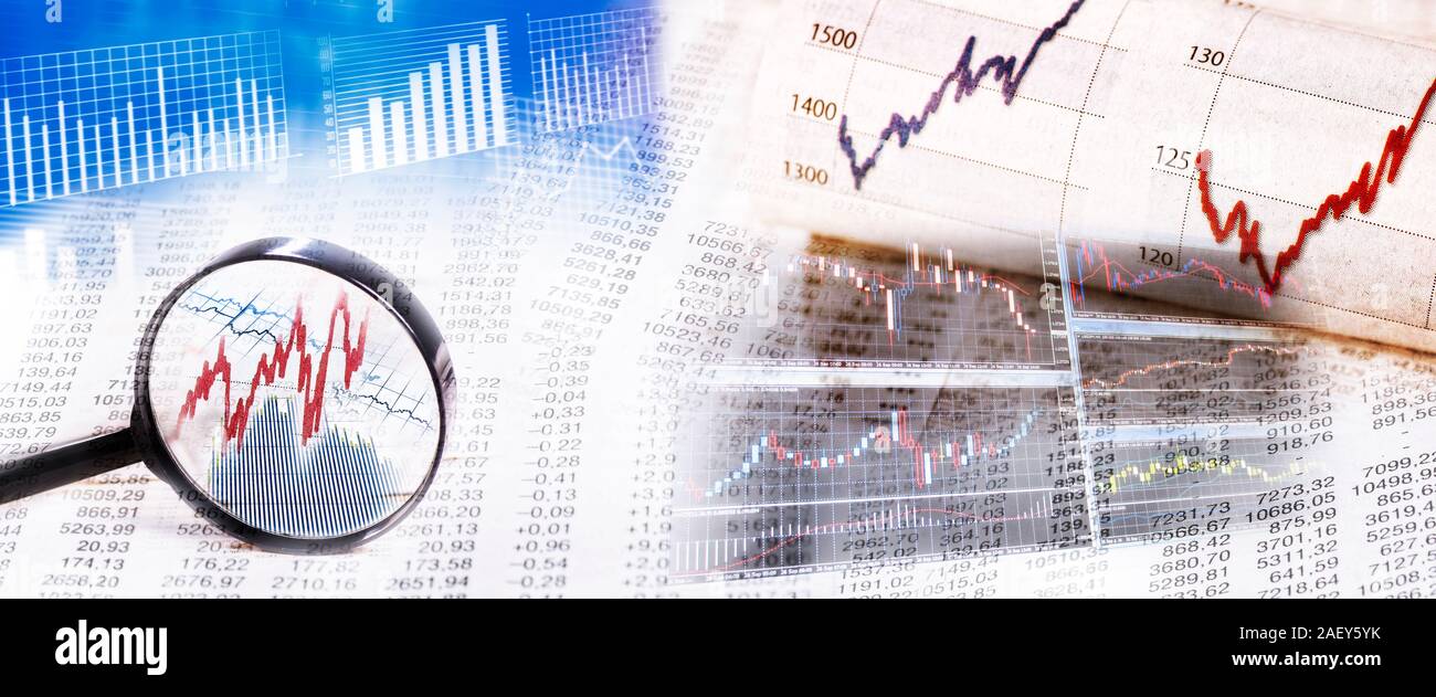 Die Aktienkurse wie Grafik und Tabelle mit Lupe und Monitor im Panorama Format Stockfoto