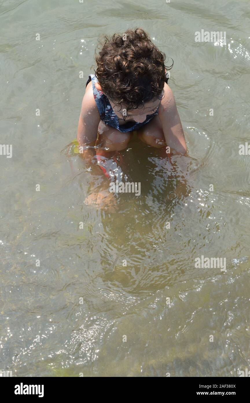 Baby in Strand Stockfoto